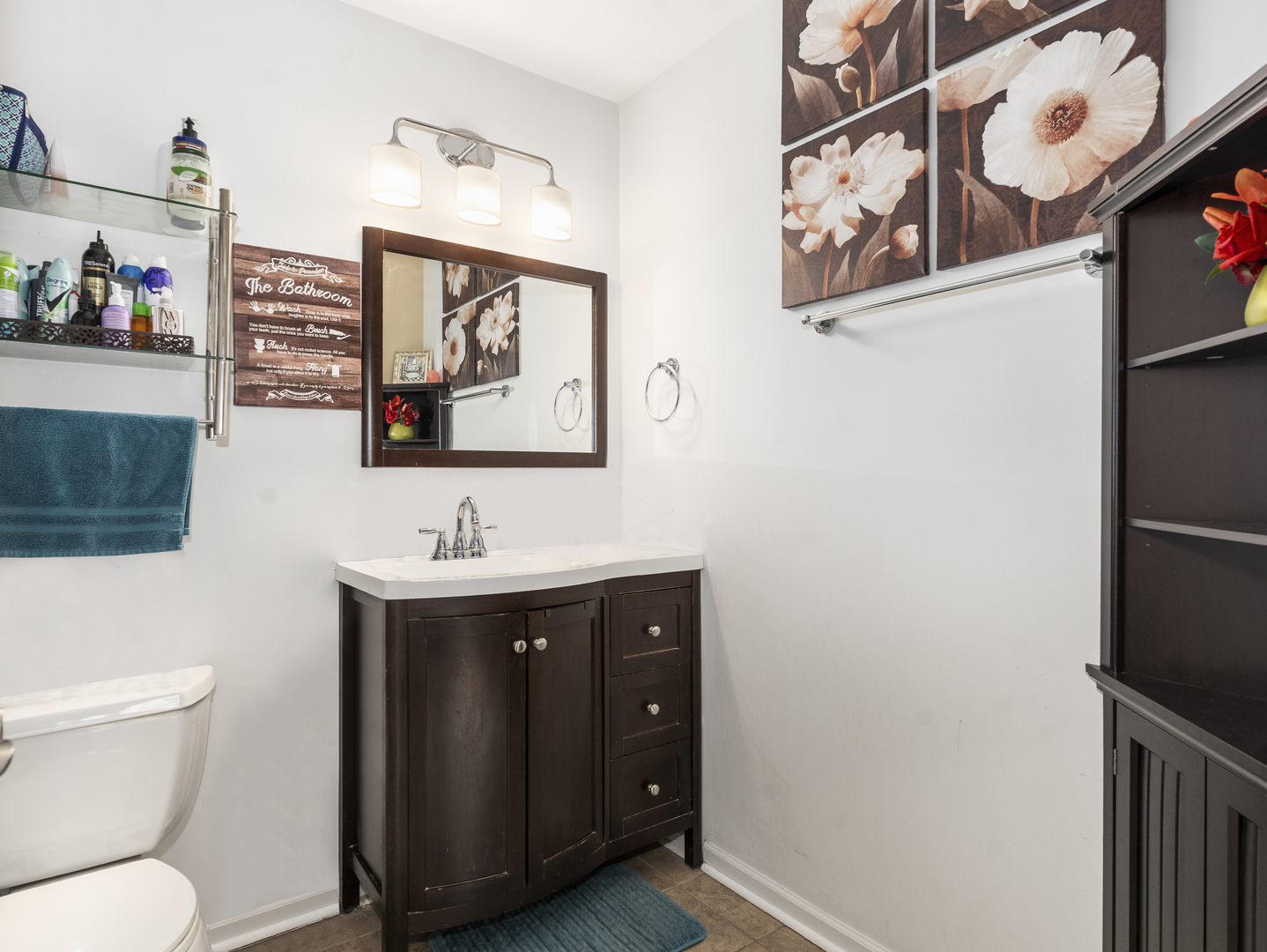 1923 Waters Edge Drive Minooka, IL 60447 - Photo 24 of 24 a bathroom with a toilet a sink and mirror