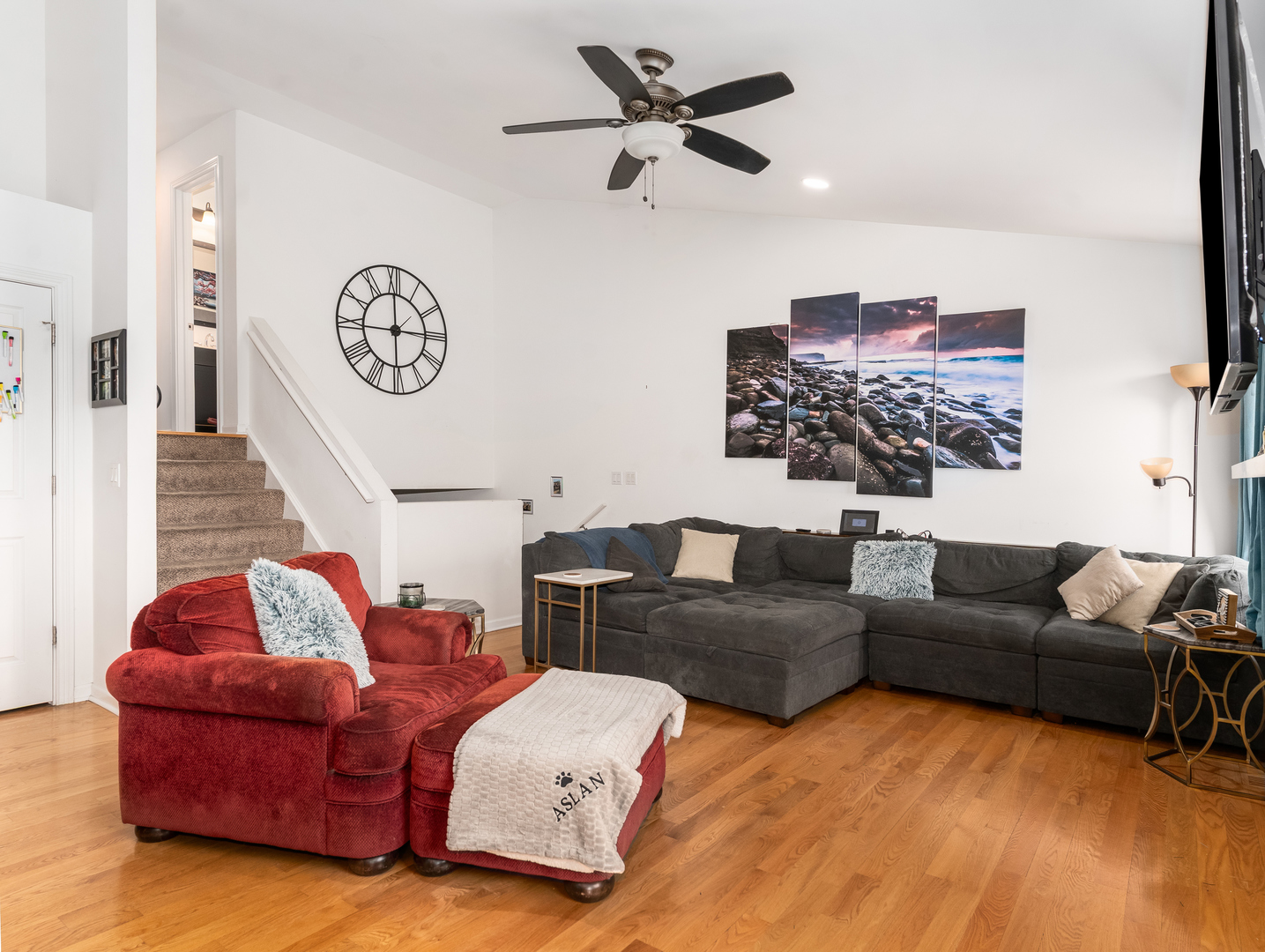 1923 Waters Edge Drive Minooka, IL 60447 - Photo 9 of 24 a living room with furniture ceiling fan and a rug