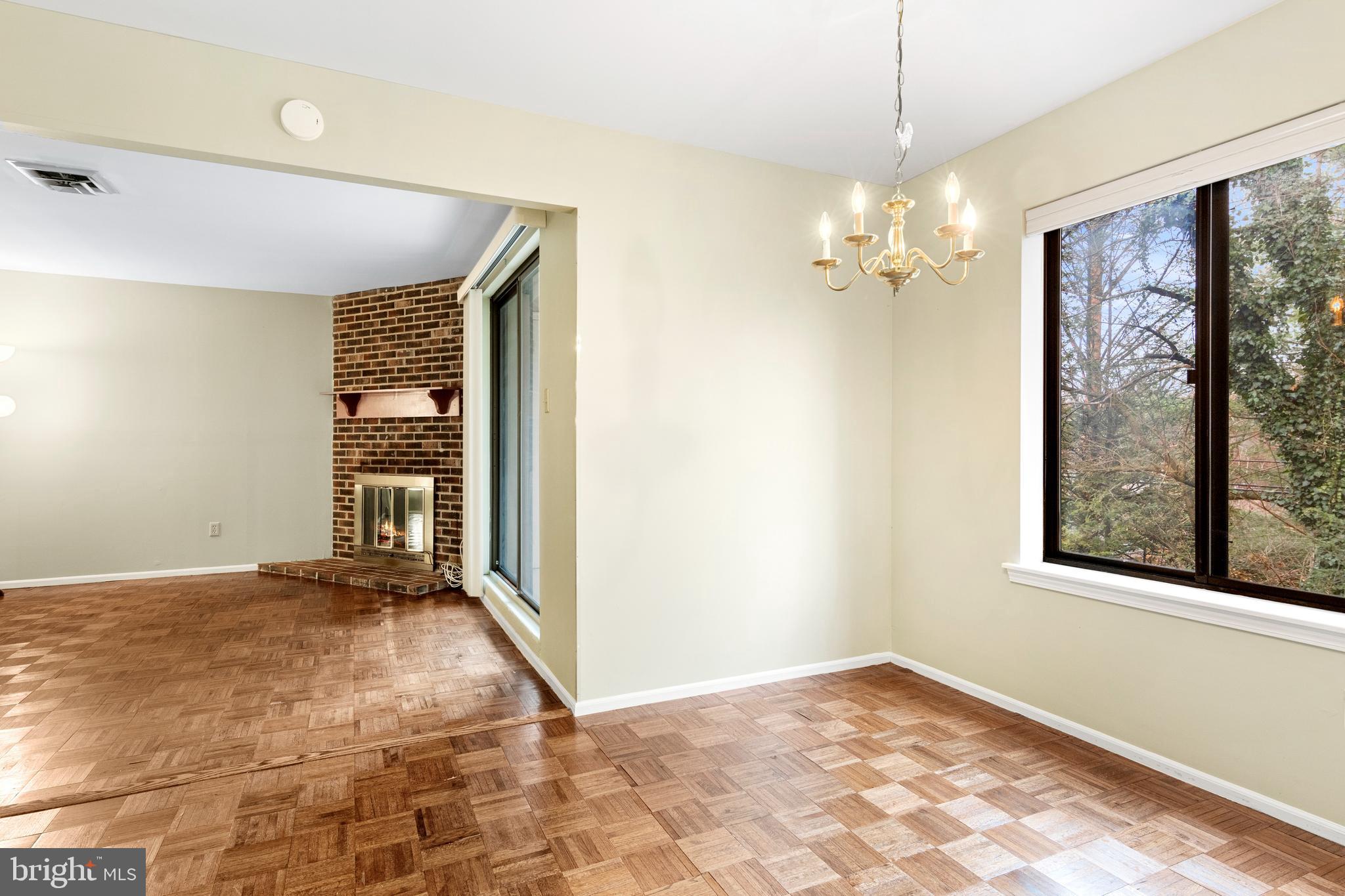 411 West Conestoga Road, Unit 18 Devon, PA 19333 - Photo 13 of 17 an empty room with windows and outdoor view