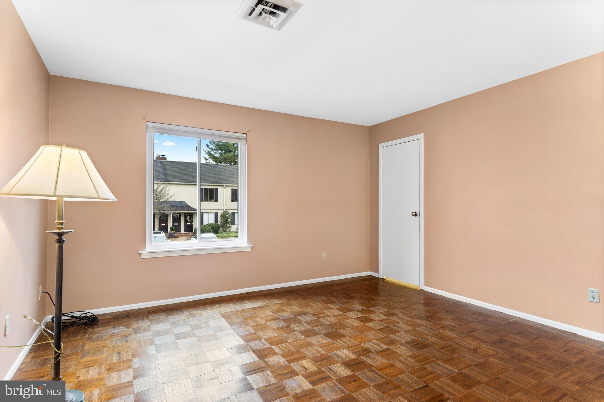 411 West Conestoga Road, Unit 18 Devon, PA 19333 - Photo 9 of 17 an empty room with windows