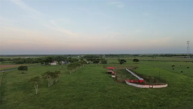 a view of a lake with a big yard