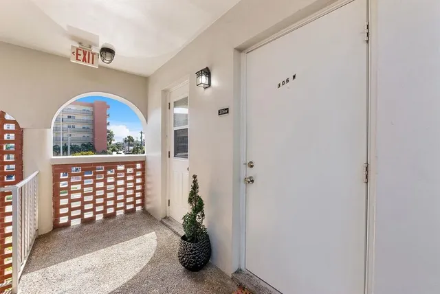 a view of entryway with wooden floor