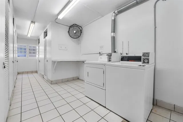 a view of bathroom with dual sinks
