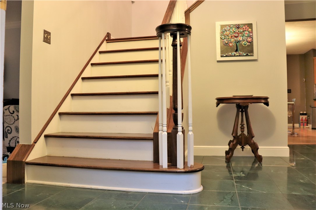 8360 Kinsman Road Novelty, OH 44072 - Photo 4 of 35 Two story foyer with wood staircase and marble floors