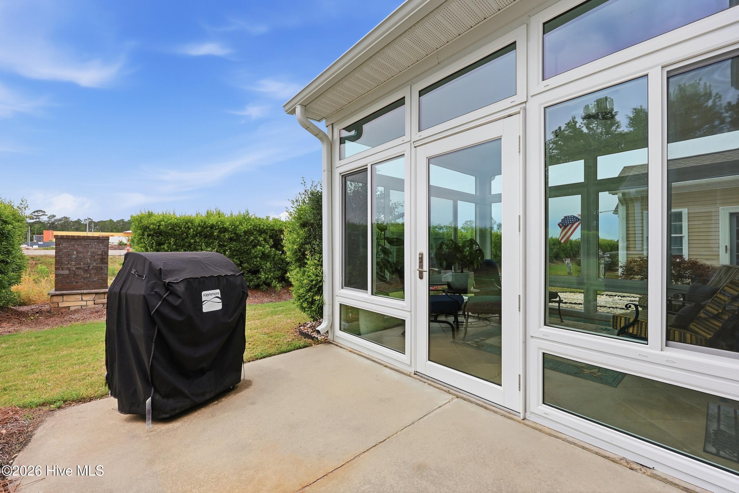 116 Freeboard Lane Calabash, NC 28467 - Photo 32 of 44 Large Sunroom with vaulted ceiling and windows