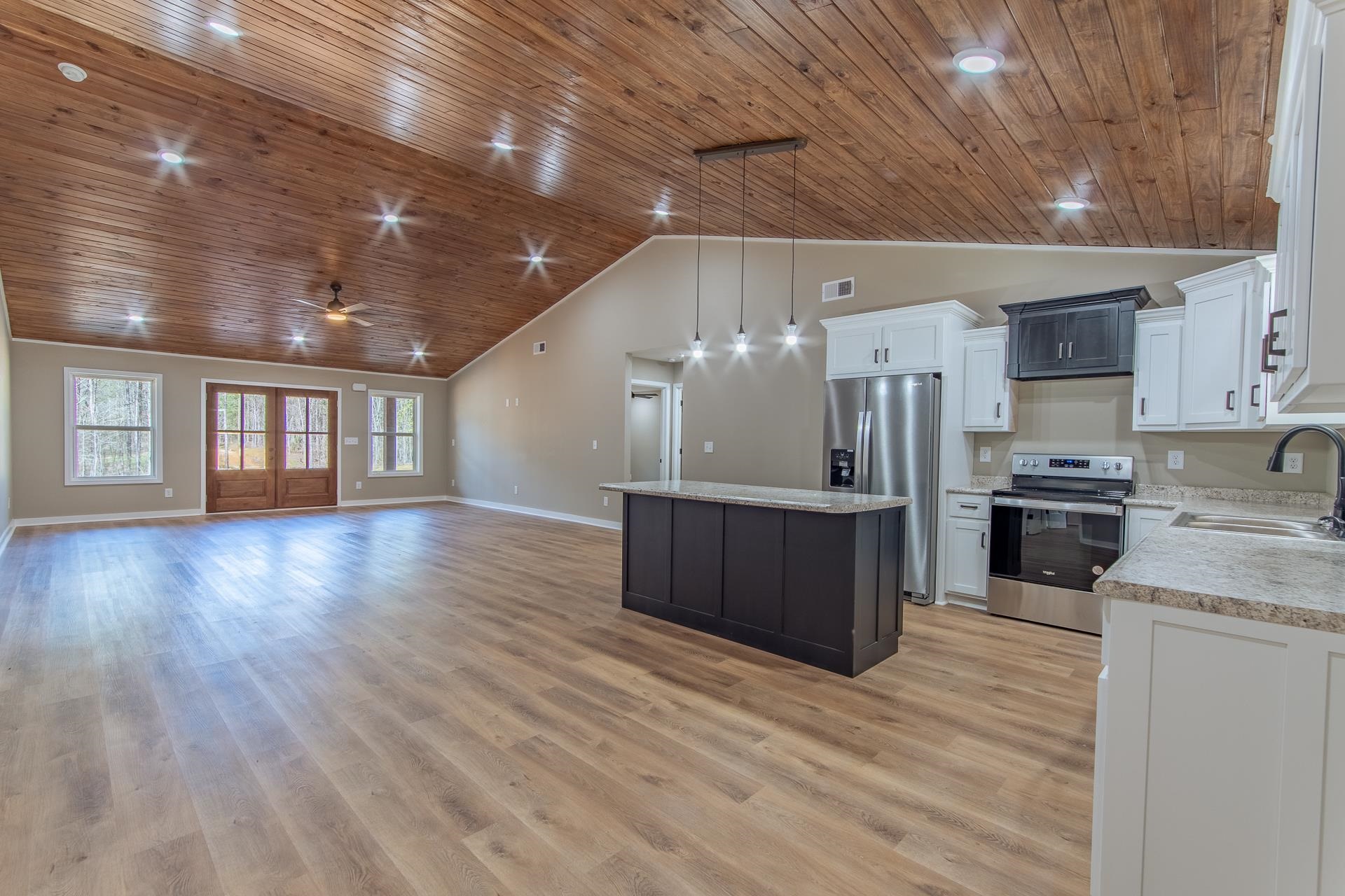 1471 Chambers Store Road Michie, TN 38357 - Photo 38 of 38 Kitchen with open floor plan, a center island, a sink, visible vents, and appliances with stainless steel finishes