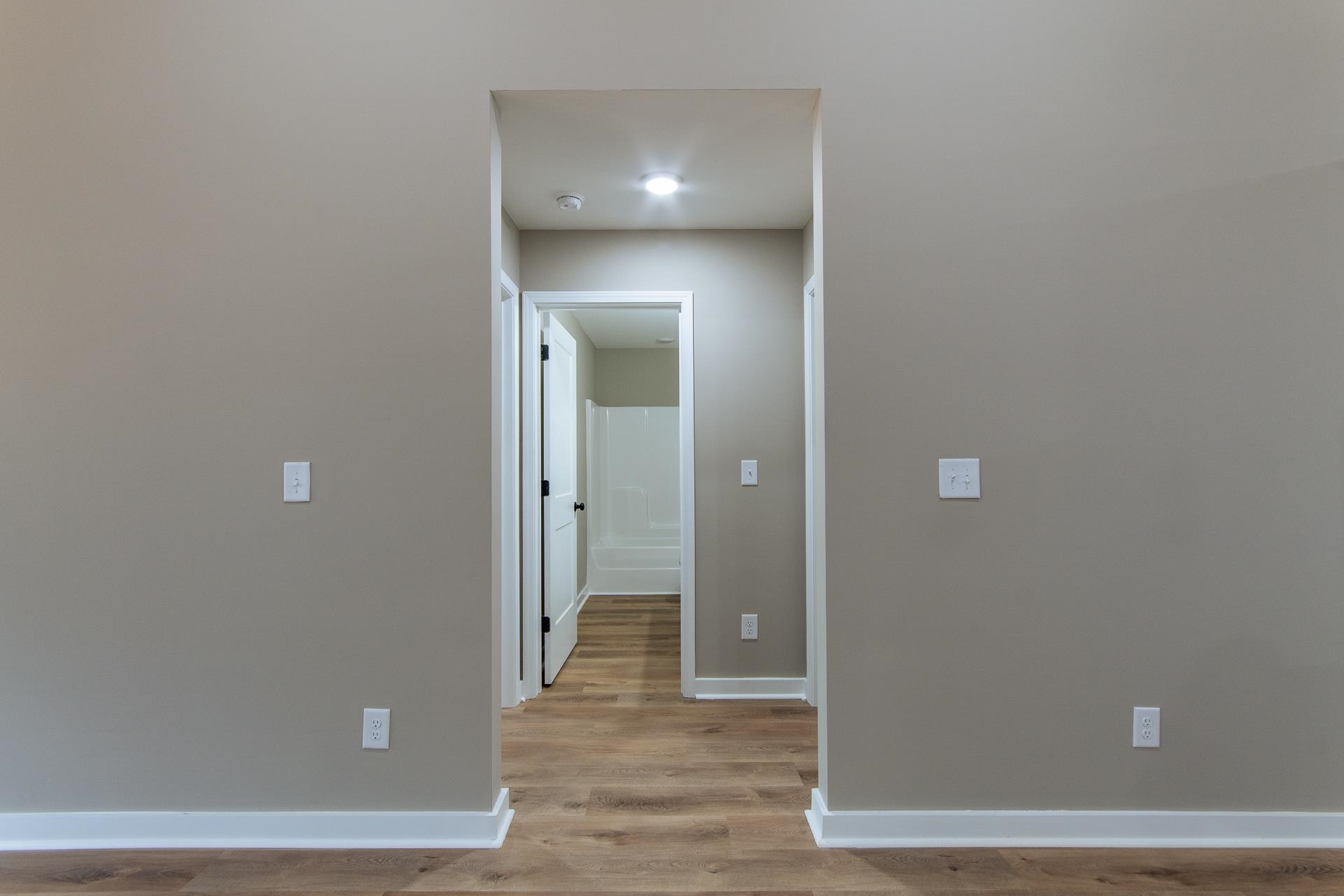 1471 Chambers Store Road Michie, TN 38357 - Photo 22 of 38 Unfurnished room featuring baseboards and light wood-style flooring