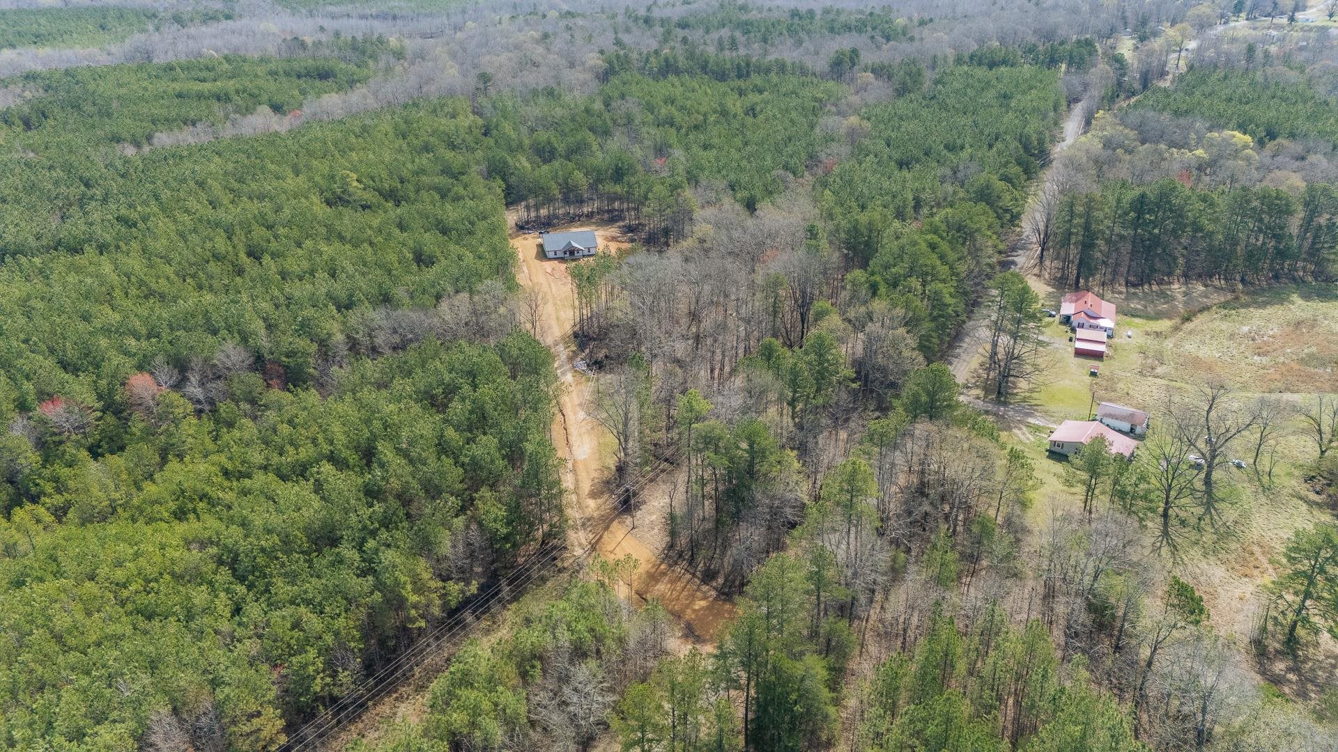 1471 Chambers Store Road Michie, TN 38357 - Photo 33 of 38 Aerial view featuring a view of trees