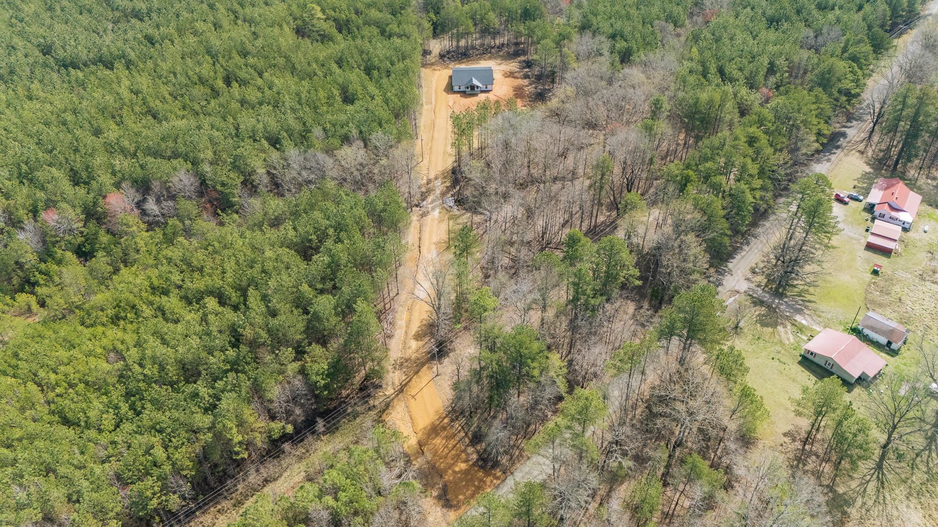 1471 Chambers Store Road Michie, TN 38357 - Photo 34 of 38 Drone / aerial view with a forest view