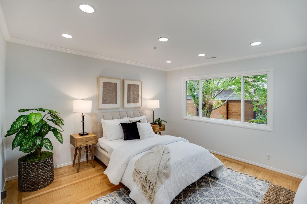 1067 Rio Vista Drive Pacifica, CA 94044 - Photo 16 of 43 a bedroom with bed and a window