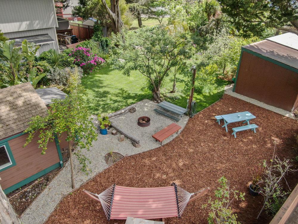 1067 Rio Vista Drive Pacifica, CA 94044 - Photo 27 of 43 an aerial view of a house with a yard and garden