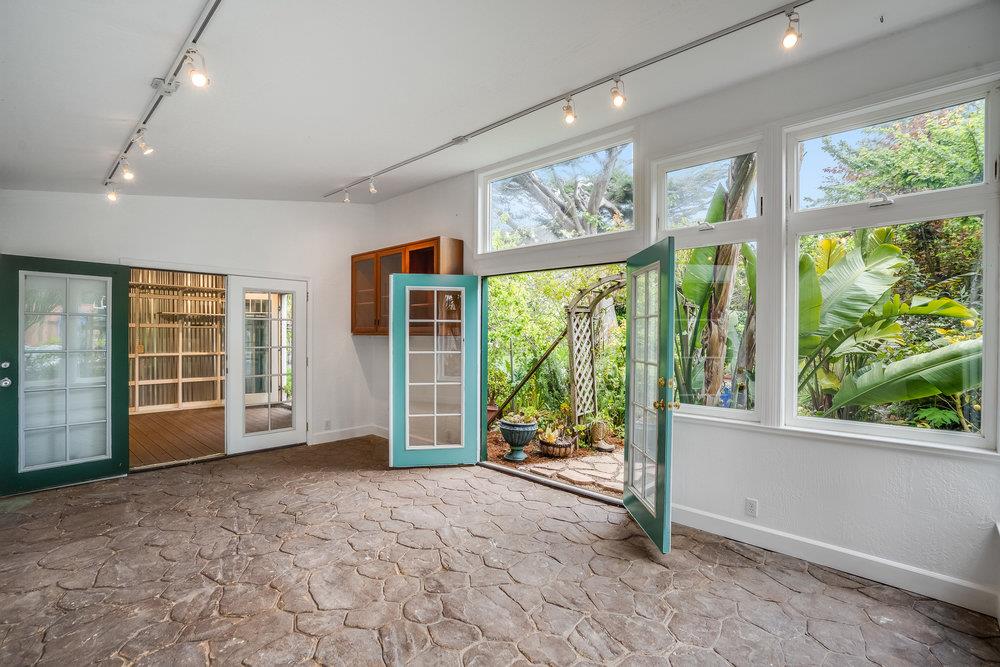 1067 Rio Vista Drive Pacifica, CA 94044 - Photo 30 of 43 an empty room with large windows