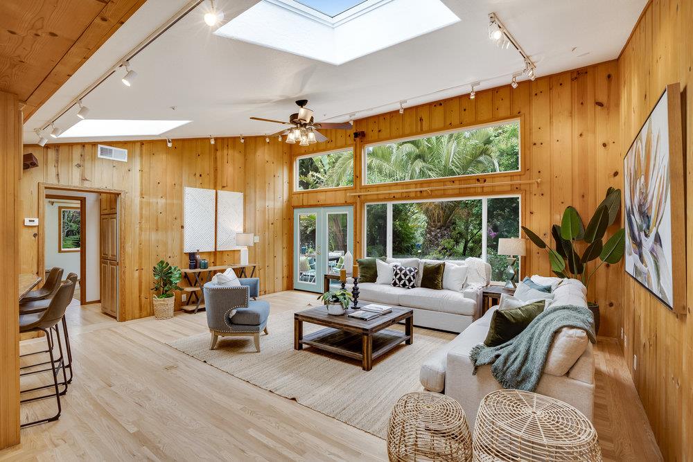 1067 Rio Vista Drive Pacifica, CA 94044 - Photo 3 of 43 a living room with furniture and a large window