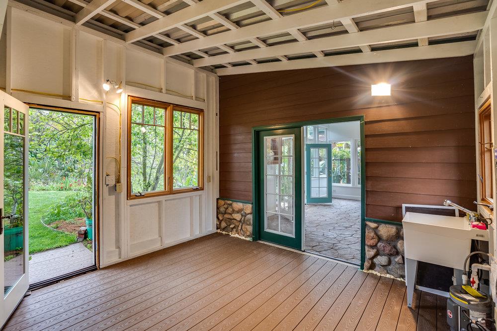 1067 Rio Vista Drive Pacifica, CA 94044 - Photo 31 of 43 a view of a room with wooden floor and balcony