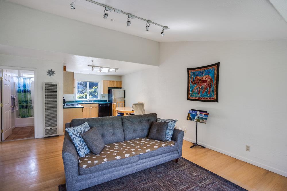 1067 Rio Vista Drive Pacifica, CA 94044 - Photo 34 of 43 a living room with furniture and kitchen view