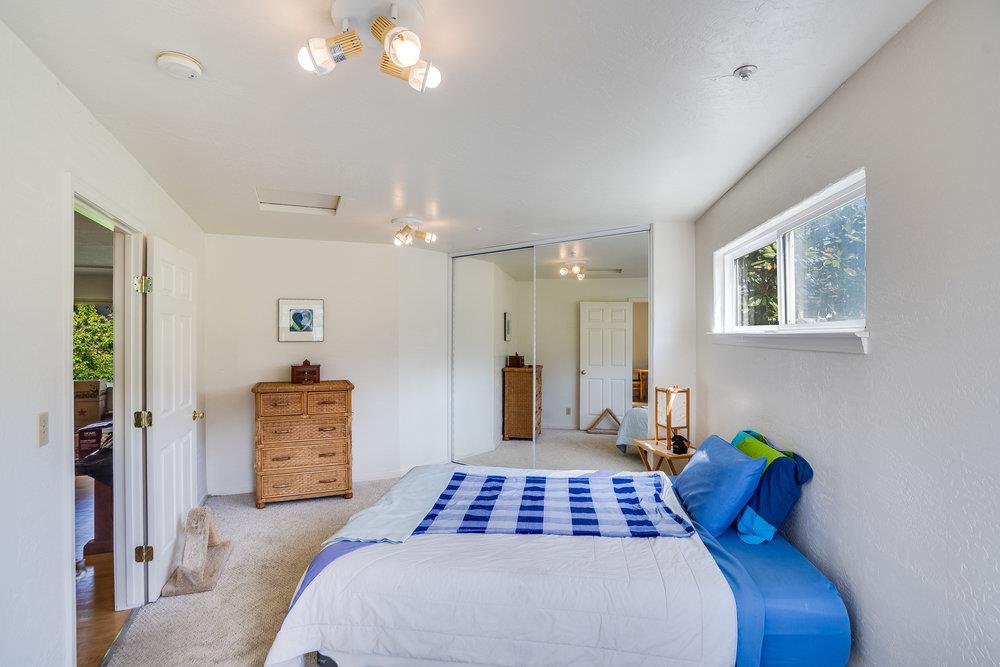1067 Rio Vista Drive Pacifica, CA 94044 - Photo 35 of 43 a bedroom with furniture and a window