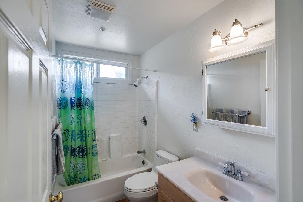 1067 Rio Vista Drive Pacifica, CA 94044 - Photo 36 of 43 a bathroom with a sink a toilet and shower