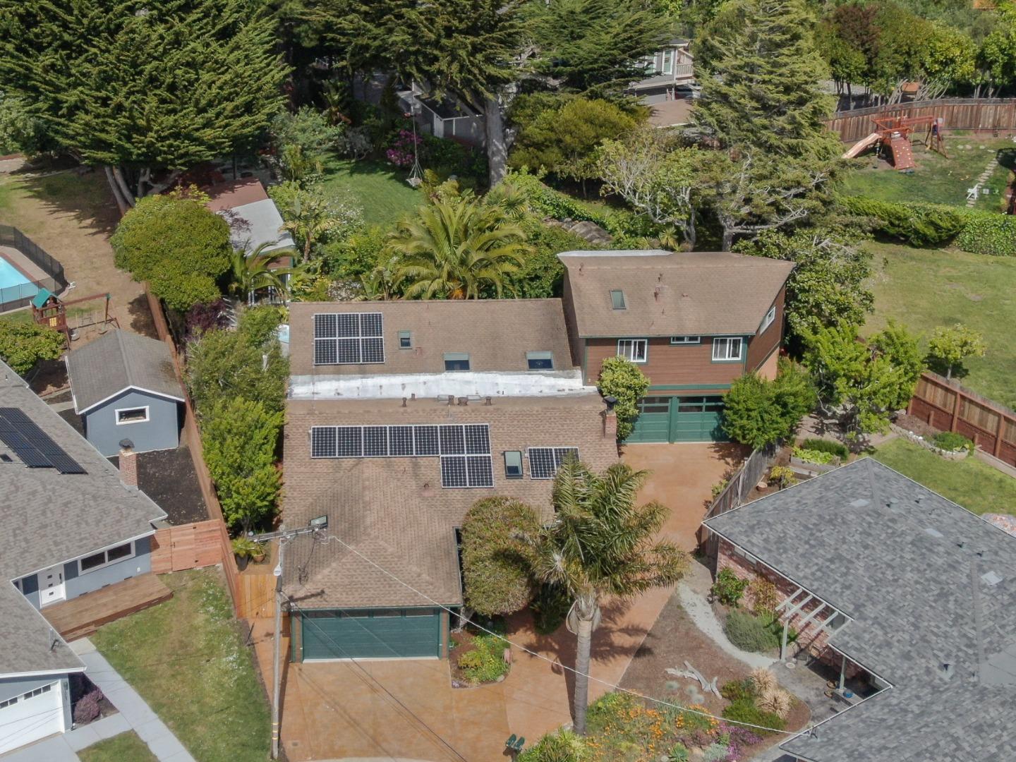 1067 Rio Vista Drive Pacifica, CA 94044 - Photo 43 of 43 an aerial view of multiple houses with yard