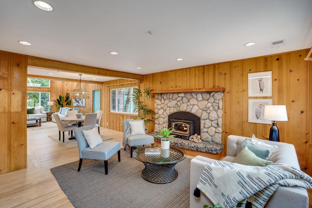 1067 Rio Vista Drive Pacifica, CA 94044 - Photo 9 of 43 a living room with furniture and a fireplace