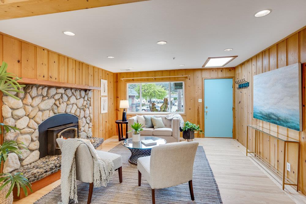 1067 Rio Vista Drive Pacifica, CA 94044 - Photo 10 of 43 a living room with furniture and a fireplace