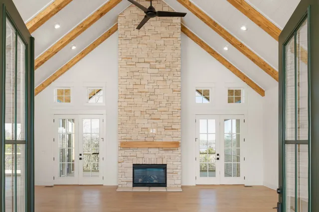 a view of a hallway with windows