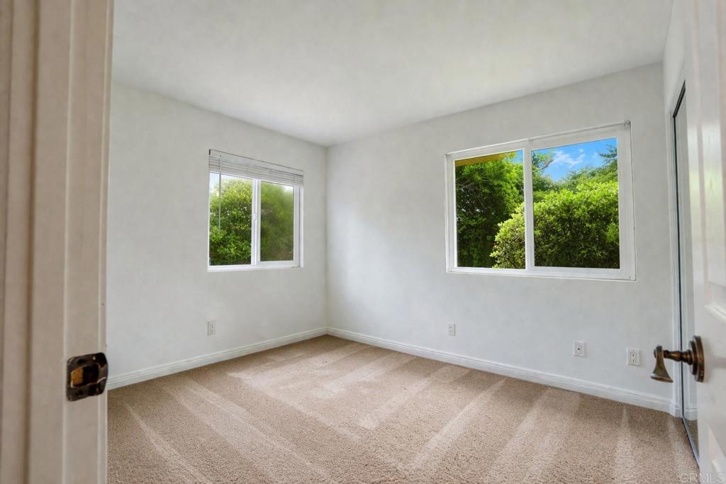 1145 Helix Street, Unit 13 Spring Valley, CA 91977 - Photo 9 of 12 an empty room with a window