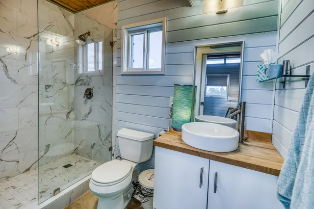 a view of a lake with a house in the background