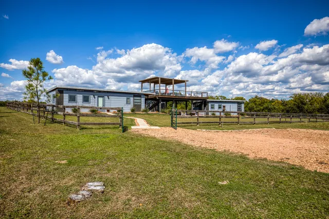 a view of a garden with an outdoor space