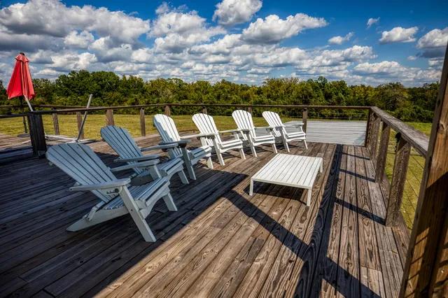 a view of a lake with houses in the background