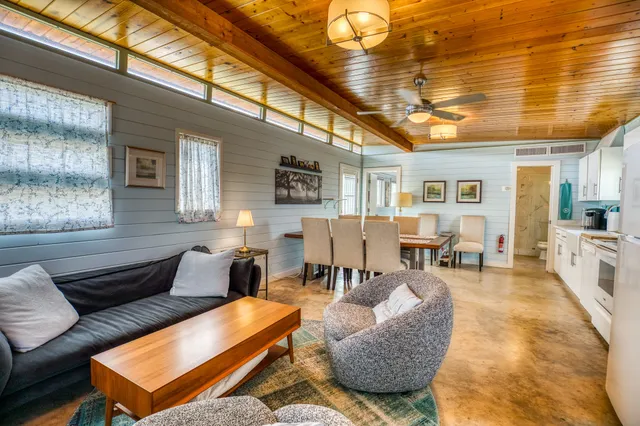 a view of a patio with a table chairs and a patio