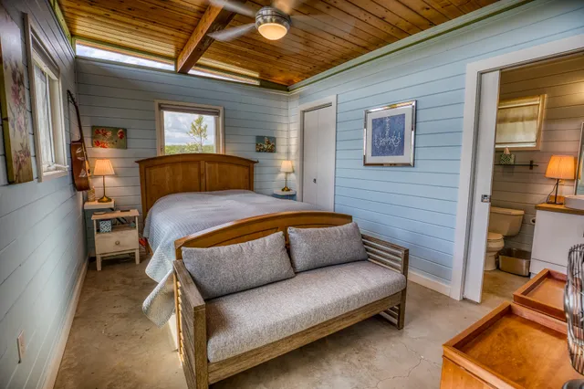 a view of a swimming pool with an outdoor seating