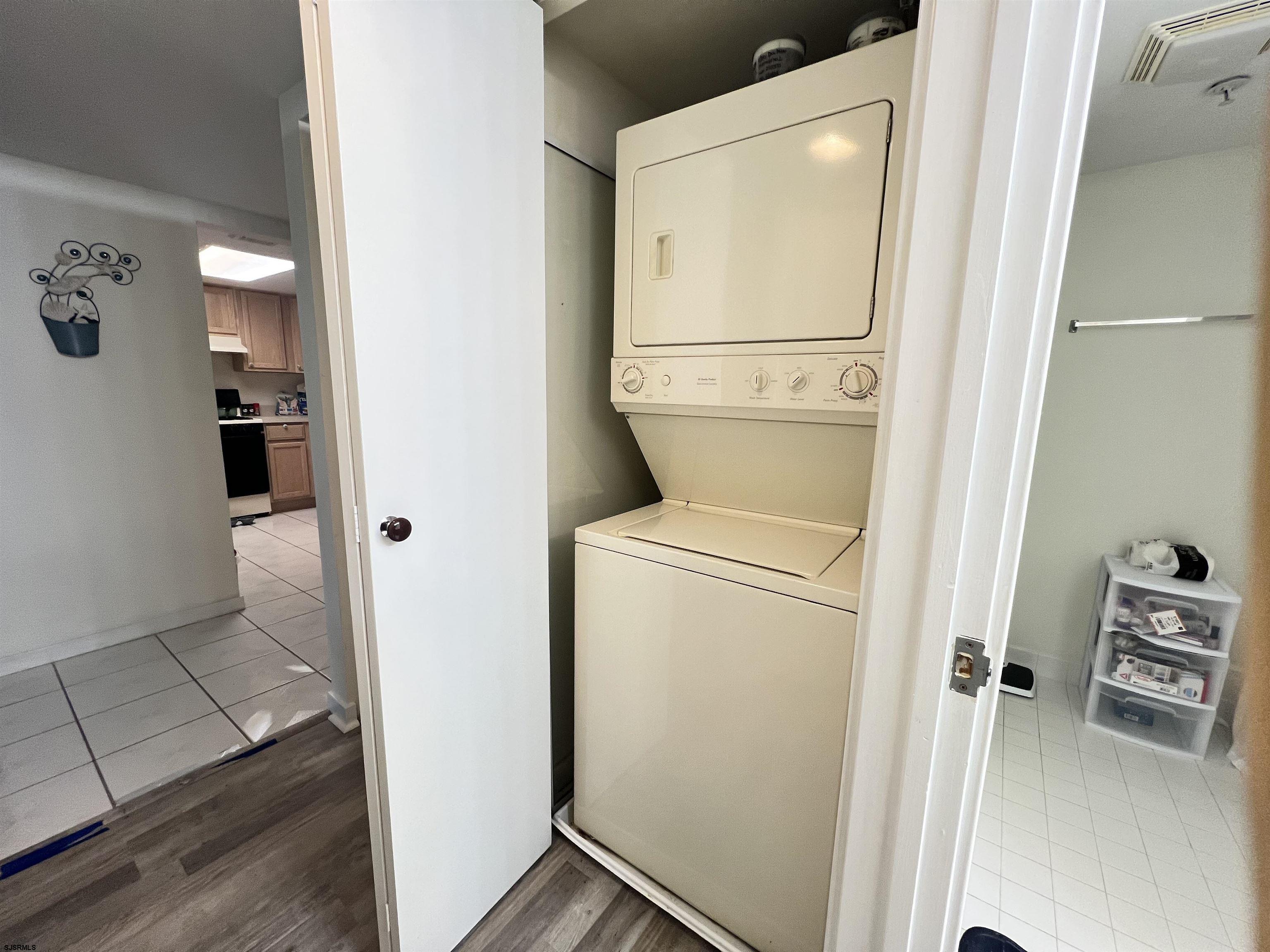 4310 Dolphin Avenue, Unit 4310 Northfield, NJ 08225 - Photo 17 of 21 a utility room with dryer and washer