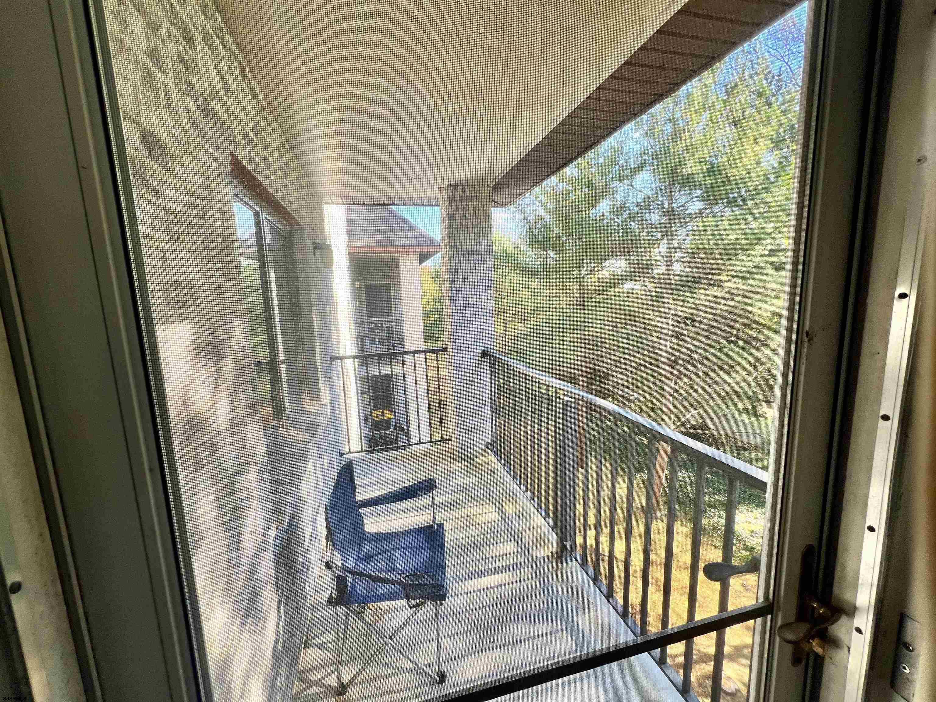 4310 Dolphin Avenue, Unit 4310 Northfield, NJ 08225 - Photo 18 of 21 a view of a balcony with wooden floor