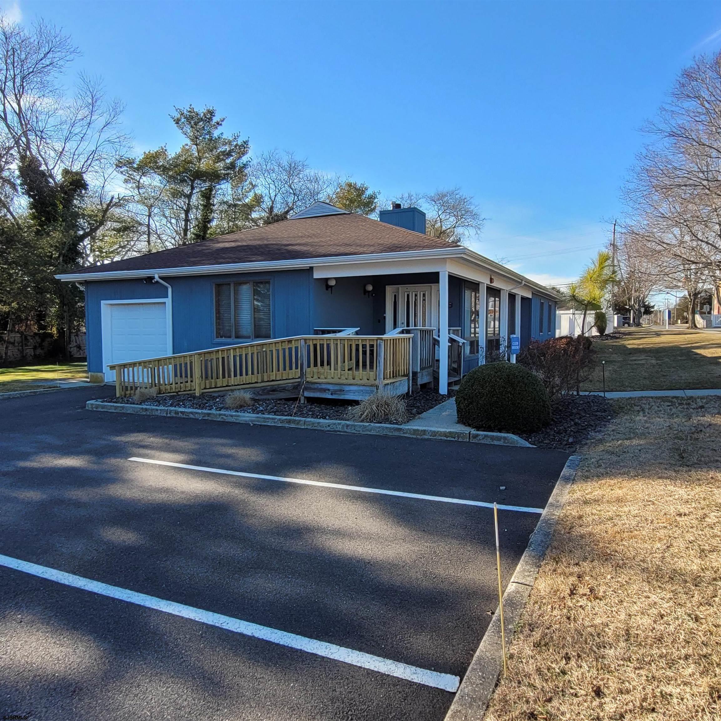 4310 Dolphin Avenue, Unit 4310 Northfield, NJ 08225 - Photo 20 of 21 a front view of a house with a yard