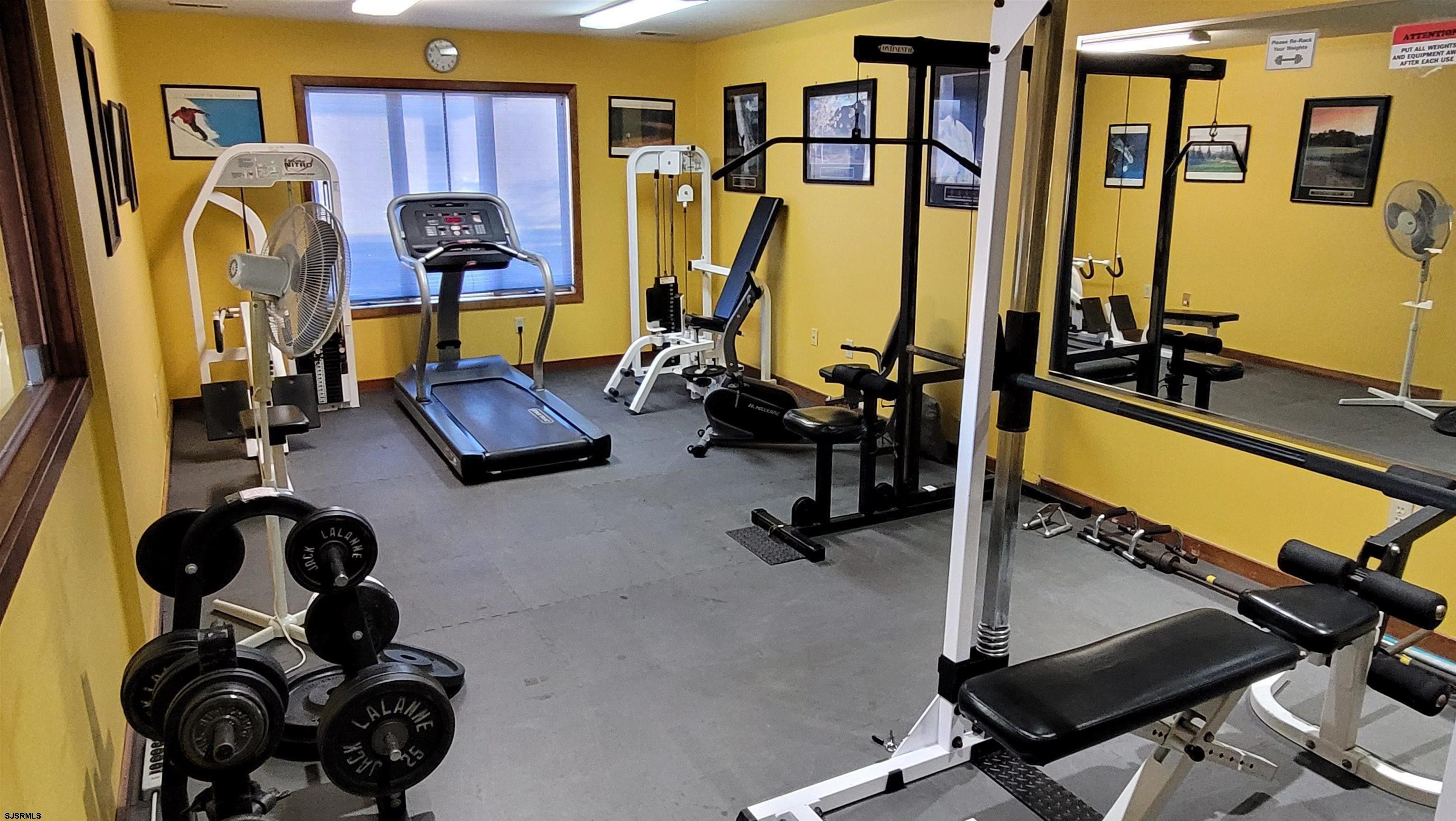 4310 Dolphin Avenue, Unit 4310 Northfield, NJ 08225 - Photo 21 of 21 a view of a room with gym equipment