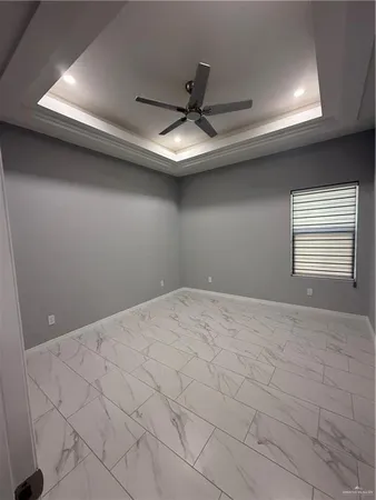 a view of empty room with windows