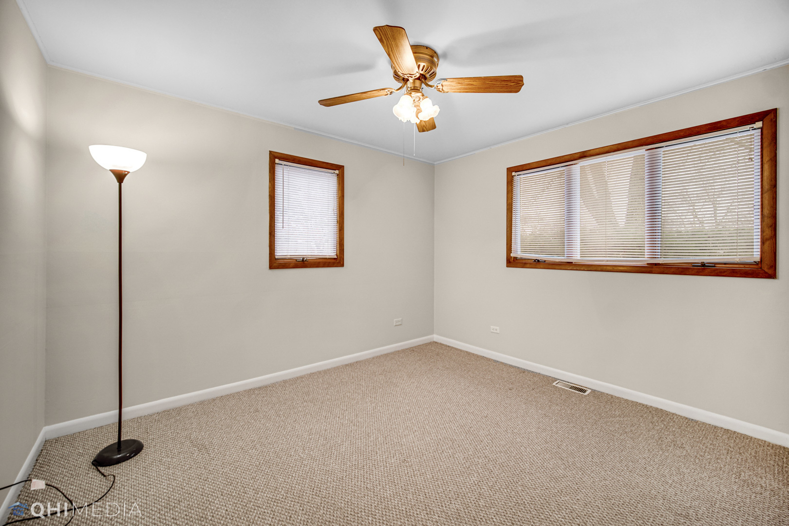 2402 Wing Street Rolling Meadows, IL 60008 - Photo 11 of 20 a view of an empty room with a window
