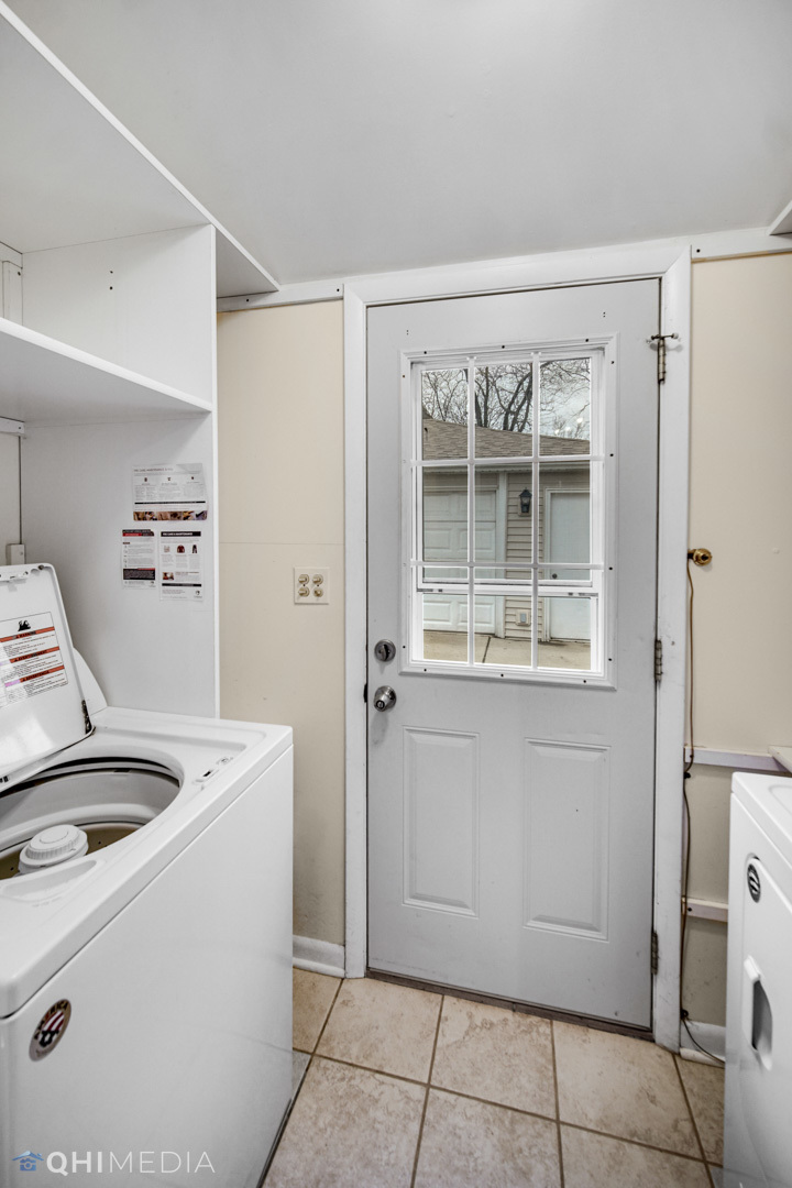 2402 Wing Street Rolling Meadows, IL 60008 - Photo 16 of 20 a utility room with dryer and washer