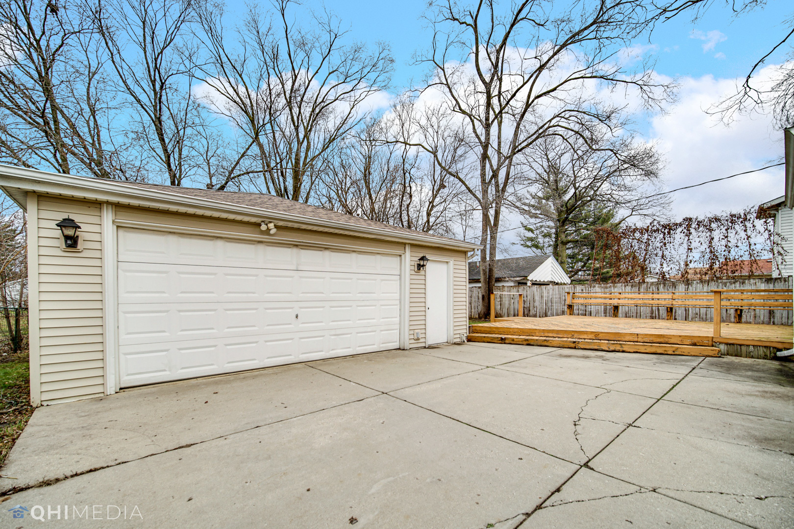 2402 Wing Street Rolling Meadows, IL 60008 - Photo 2 of 20 a view of a house with a snow on the road