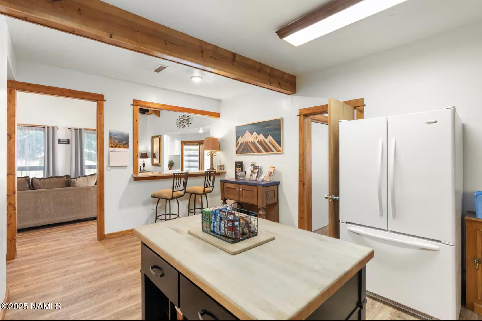 304 South 4th Street Williams, AZ 86046 - Photo 12 of 39 a kitchen with a table and chairs