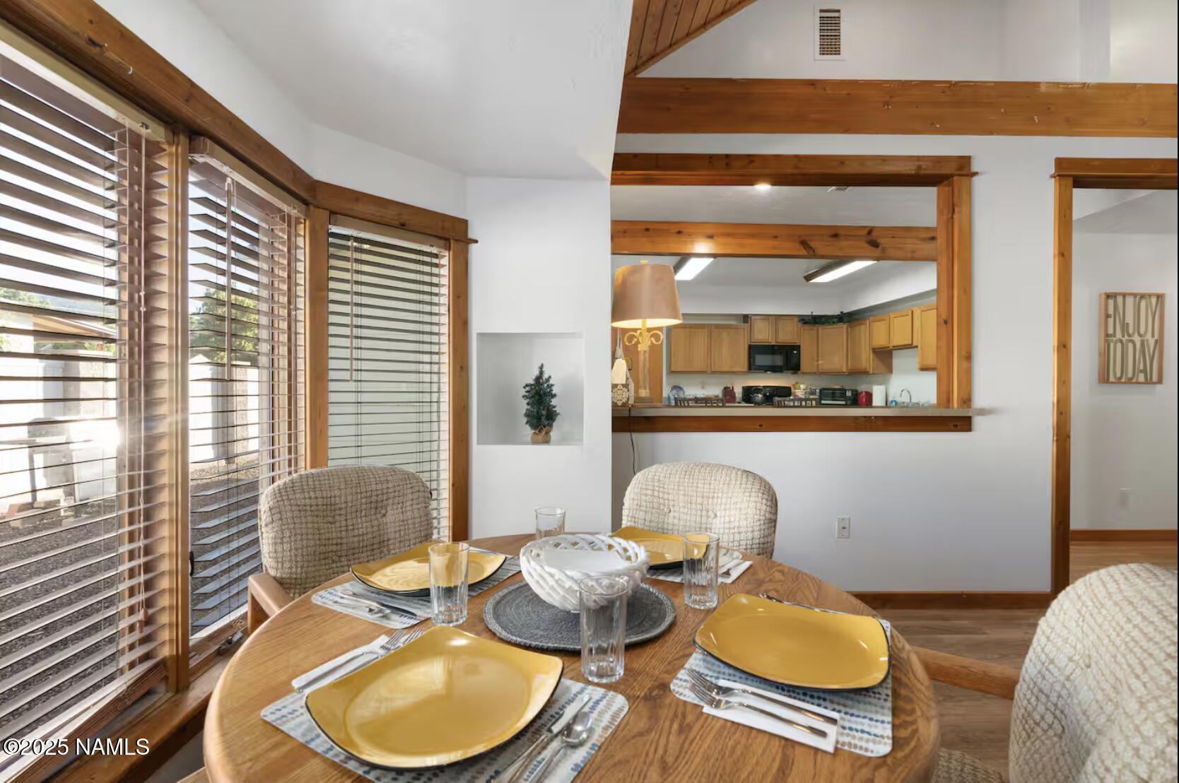 304 South 4th Street Williams, AZ 86046 - Photo 18 of 39 a dining room with furniture and window