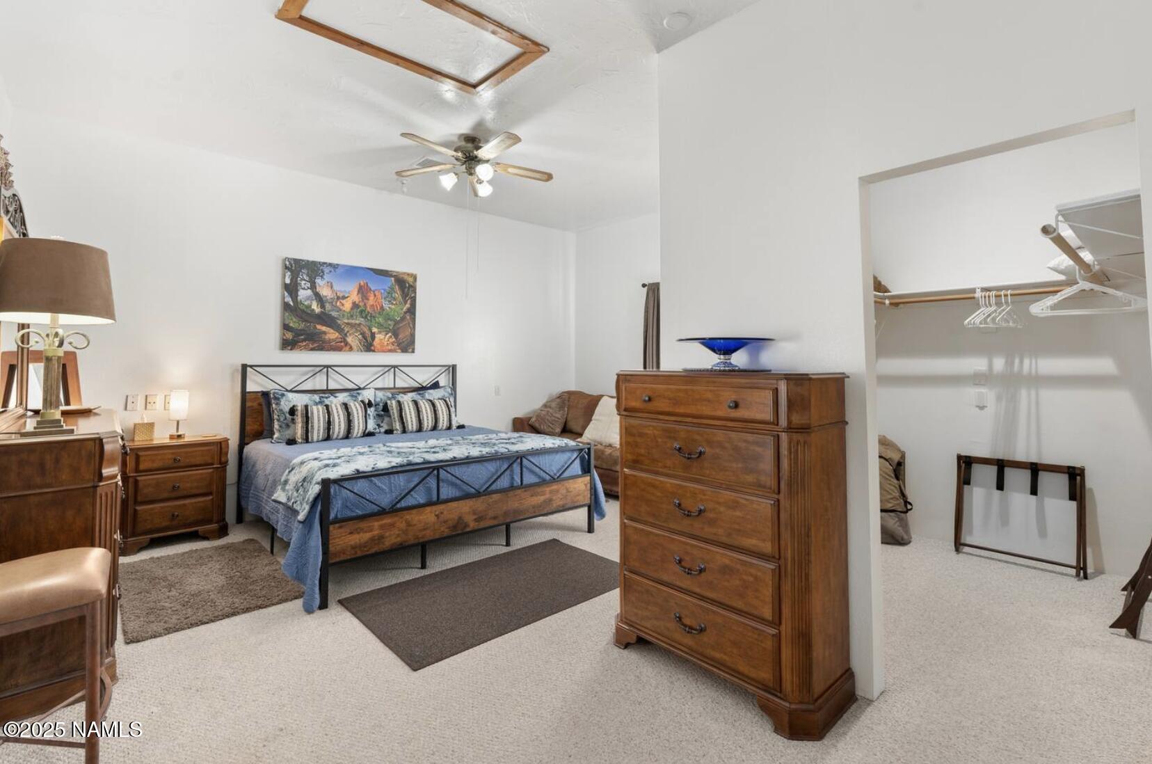 304 South 4th Street Williams, AZ 86046 - Photo 21 of 39 a bedroom with a bed and furniture