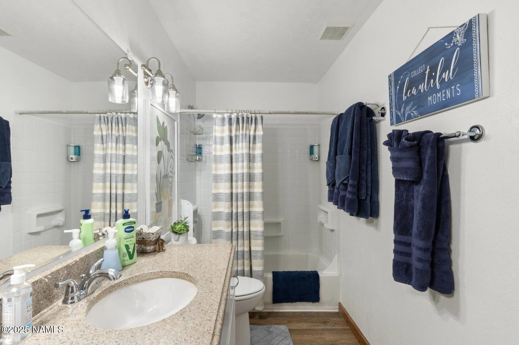 304 South 4th Street Williams, AZ 86046 - Photo 23 of 39 a bathroom with a sink and a mirror