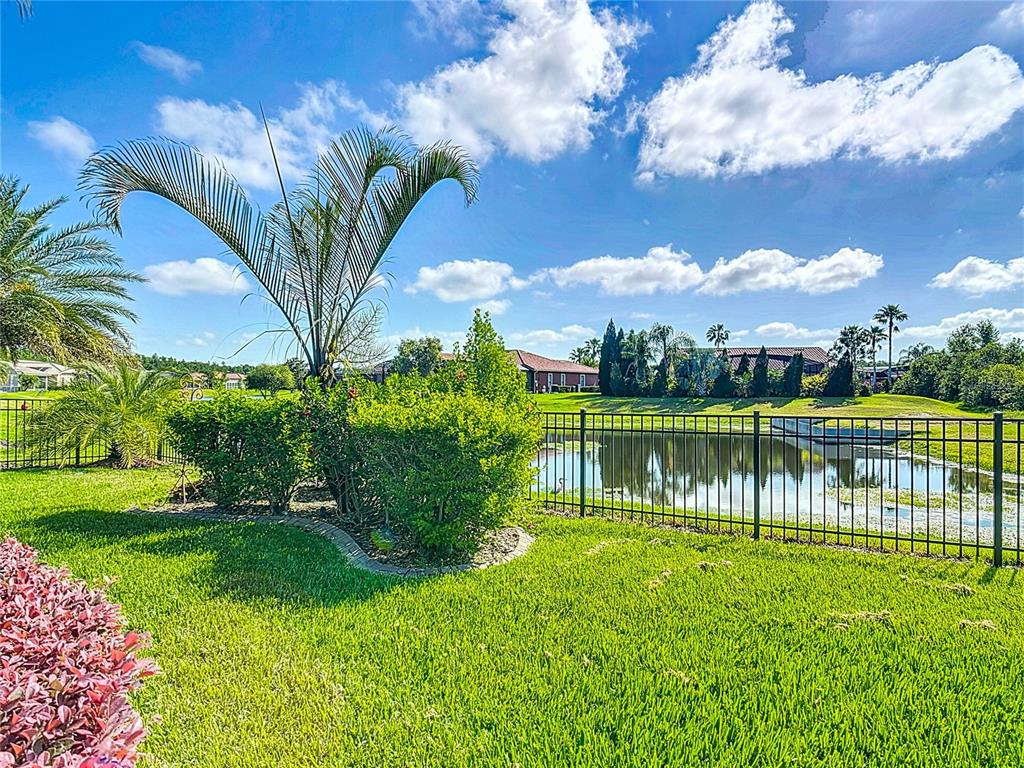 772 San Raphael Street Kissimmee, FL 34759 - Photo 11 of 94 a view of a lake with a big yard