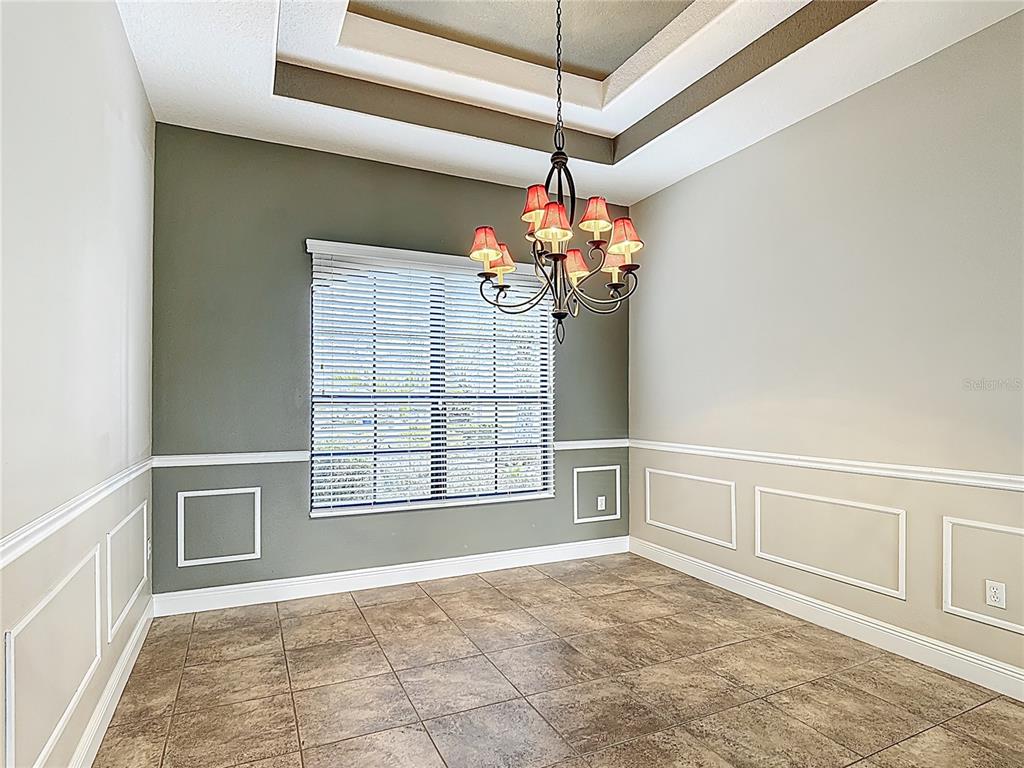 772 San Raphael Street Kissimmee, FL 34759 - Photo 19 of 94 a view of an empty room with a window