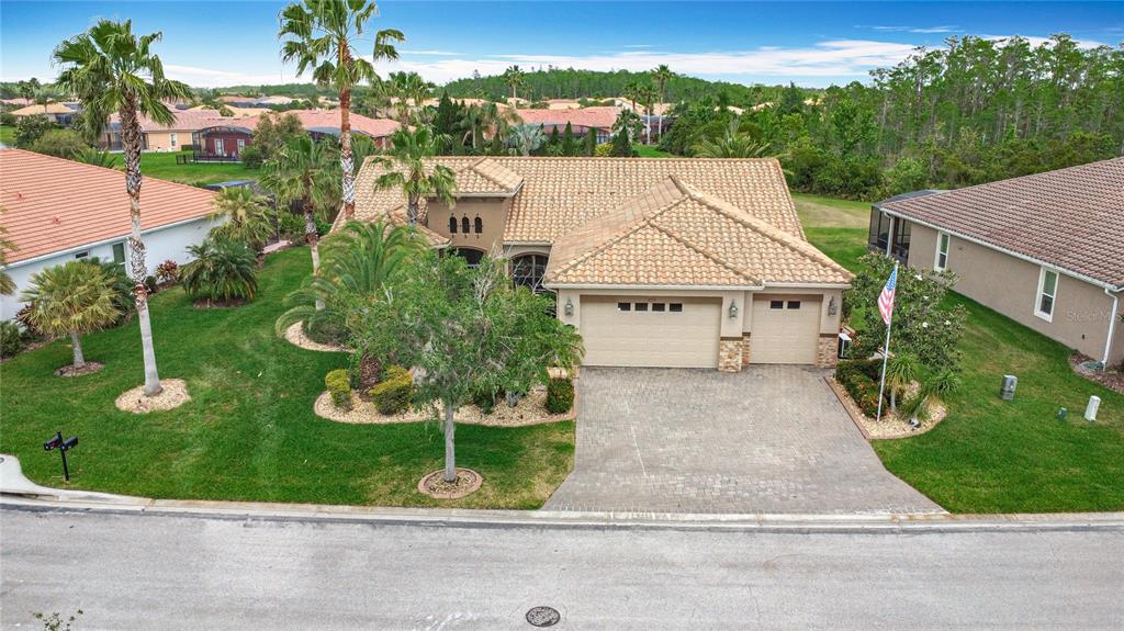 772 San Raphael Street Kissimmee, FL 34759 - Photo 2 of 94 front view of house with a yard