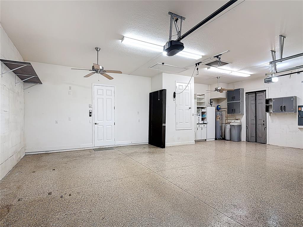 772 San Raphael Street Kissimmee, FL 34759 - Photo 52 of 94 a view of a big room with refrigerator and windows