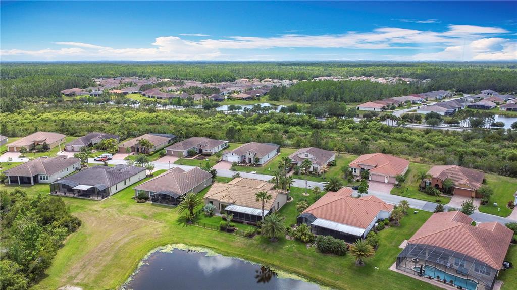 772 San Raphael Street Kissimmee, FL 34759 - Photo 66 of 94 a view of a city with lots of residential buildings ocean and mountain view in back