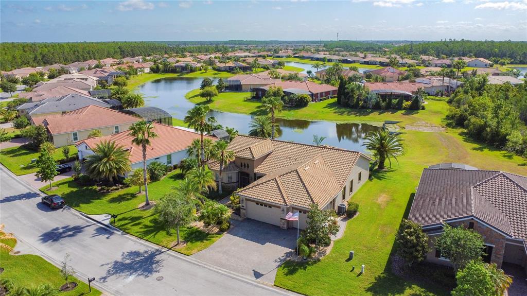 772 San Raphael Street Kissimmee, FL 34759 - Photo 74 of 94 an aerial view of a house with a swimming pool yard and outdoor seating