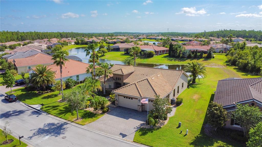 772 San Raphael Street Kissimmee, FL 34759 - Photo 75 of 94 an aerial view of a house with a swimming pool yard and outdoor seating